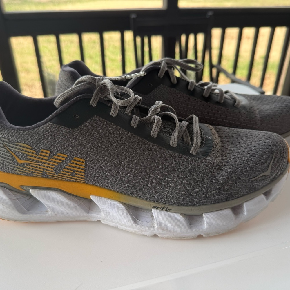 Hoka Men's Elevon road running shoes size 11.5. In Nine iron/Alloy colorway.